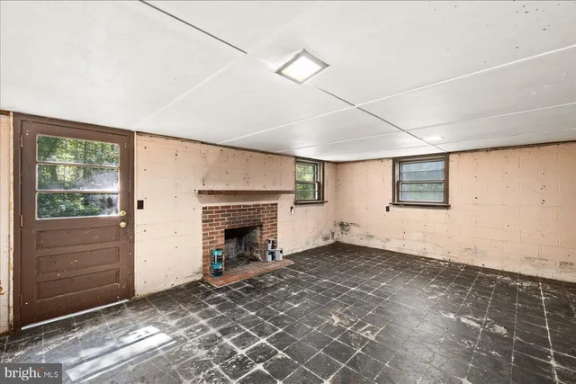 an empty room with windows