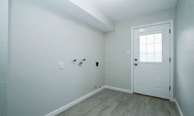 a view of small space with wooden floor