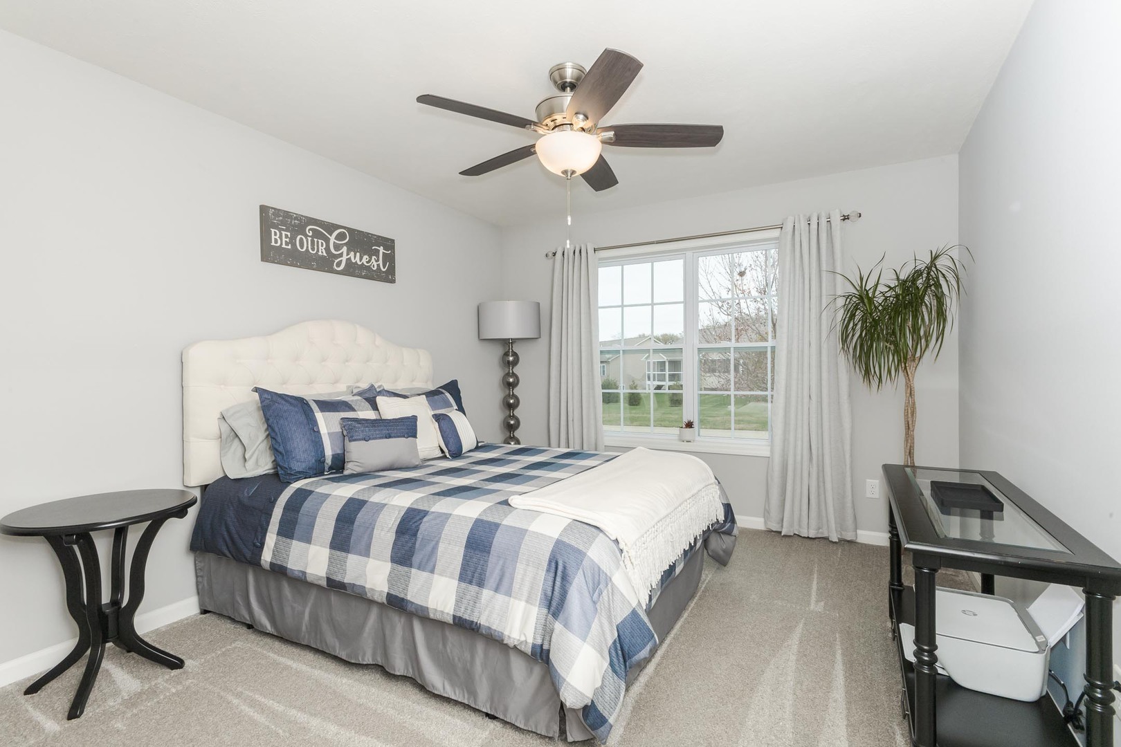 231 Eugene Drive Normal, IL 61761 - Photo 16 of 30 a bedroom with a bed and a large window