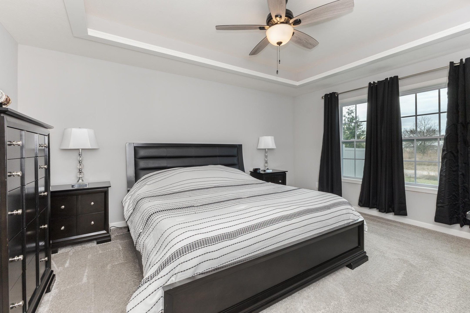 231 Eugene Drive Normal, IL 61761 - Photo 19 of 30 a bedroom with a bed and window