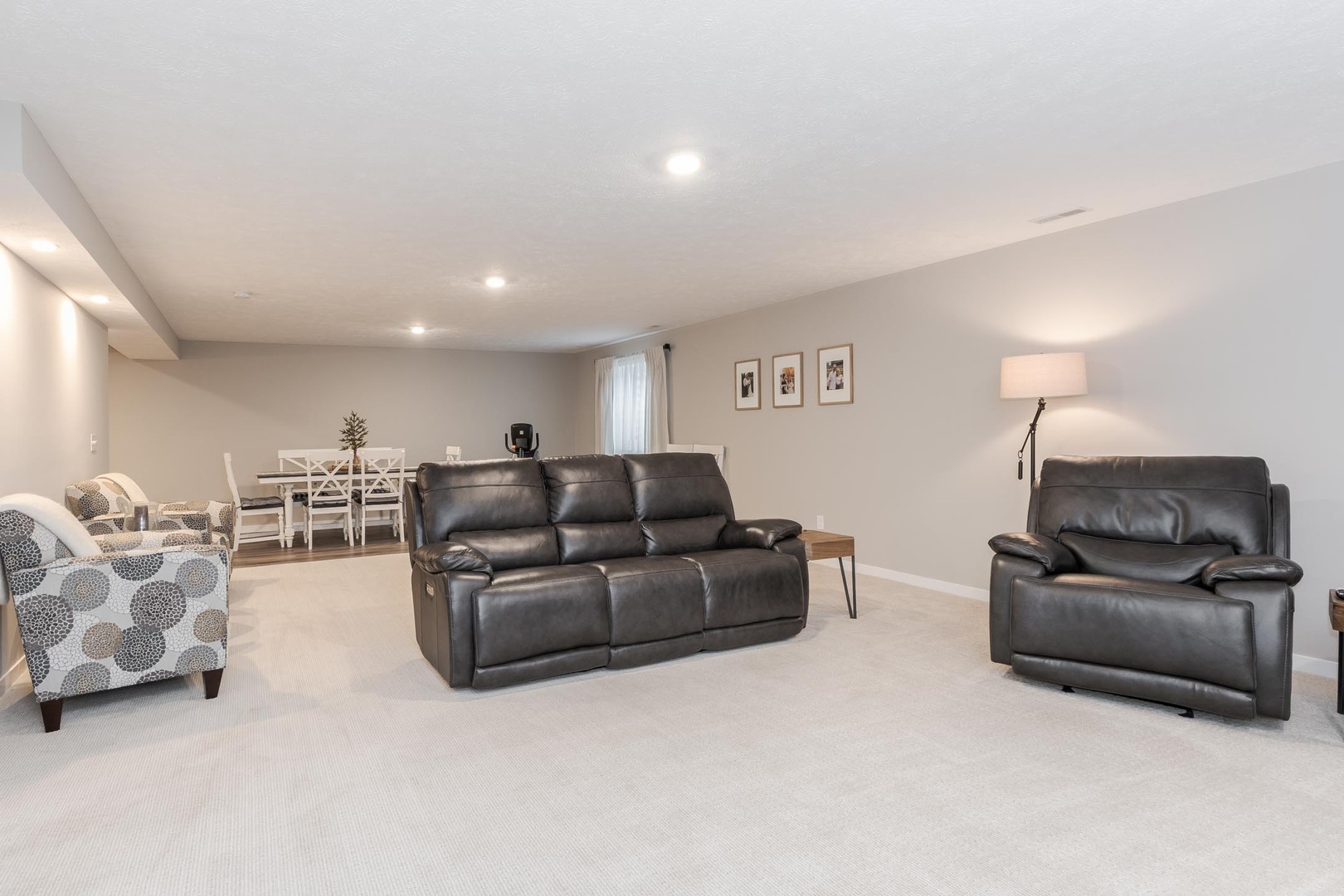 231 Eugene Drive Normal, IL 61761 - Photo 24 of 30 a living room with furniture and a lamp