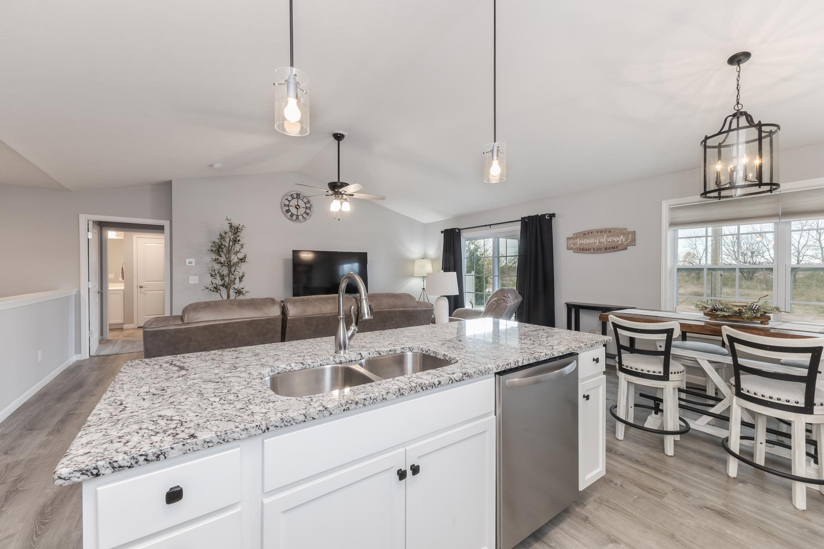 231 Eugene Drive Normal, IL 61761 - Photo 7 of 30 a kitchen with center island table and chairs