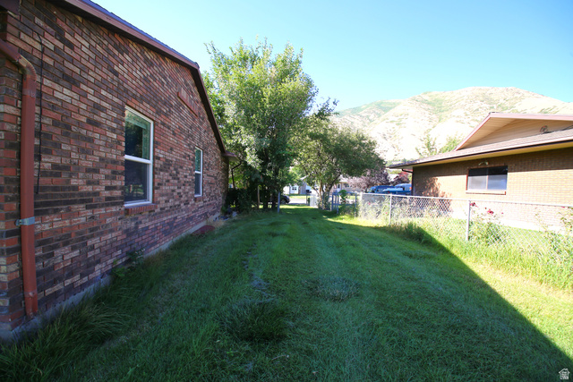 1612 East 450 South Springville, UT 84663 - Photo 2 of 48 Brick exterior with white-framed windows