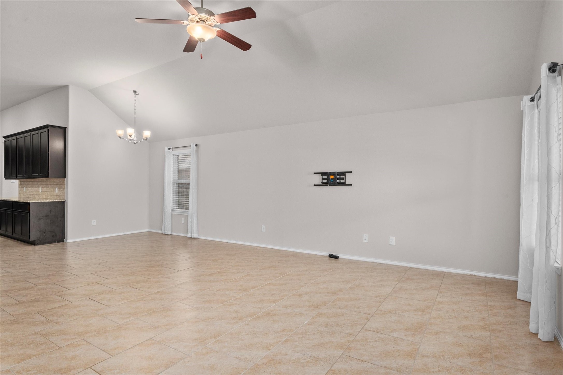 5210 Adria Hills Circle Spring, TX 77389 - Photo 13 of 42 an empty room with a empty space and a ceiling fan
