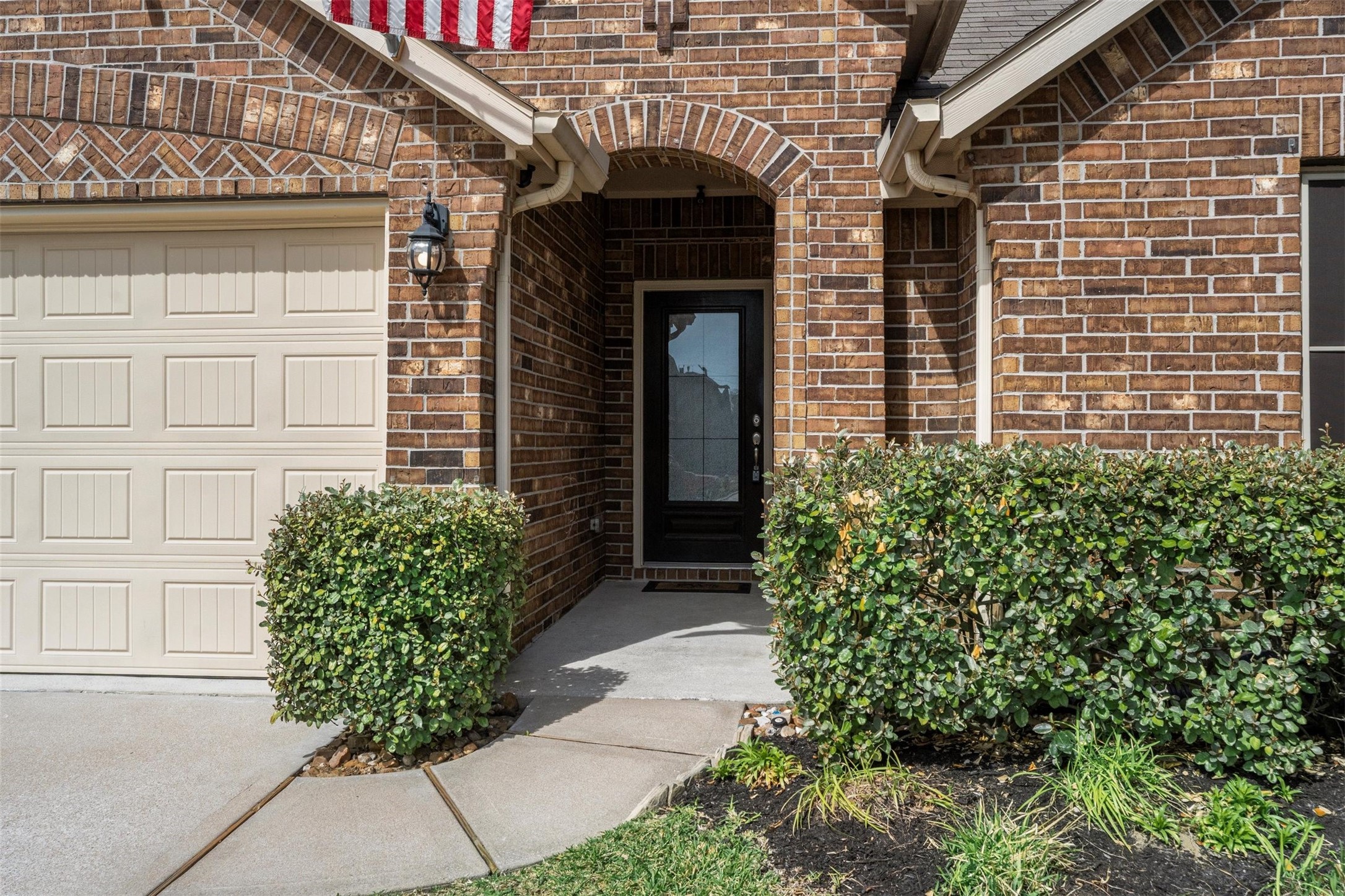 5210 Adria Hills Circle Spring, TX 77389 - Photo 2 of 42 a front view of a house with garden