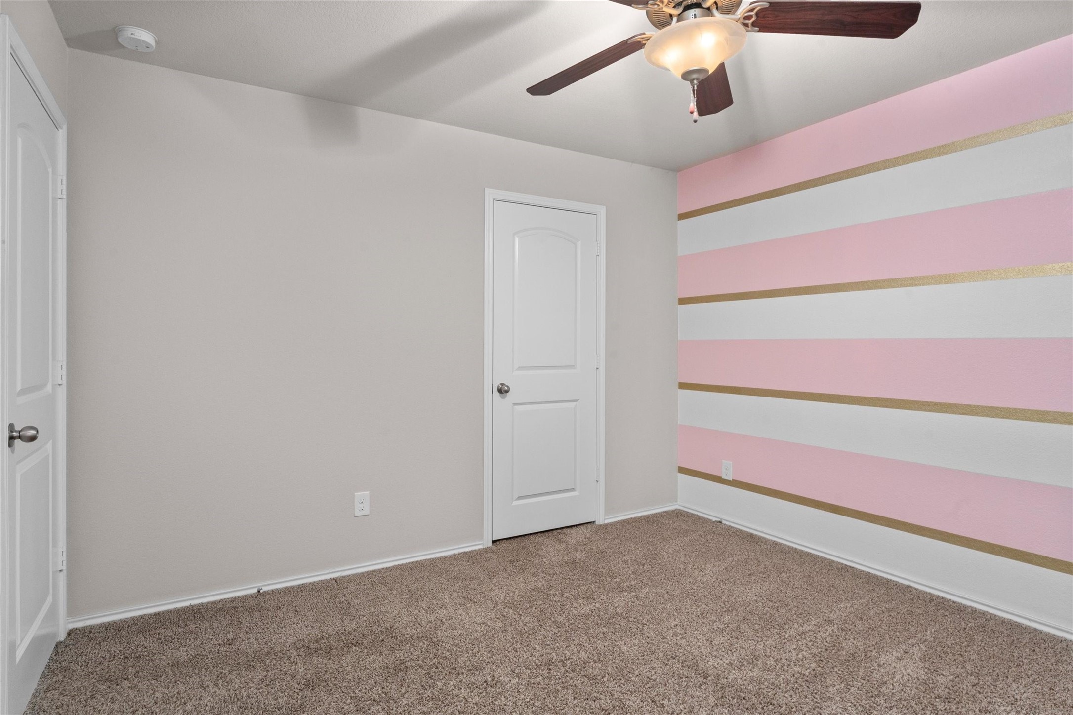 5210 Adria Hills Circle Spring, TX 77389 - Photo 25 of 42 a view of an empty room with a chandelier fan