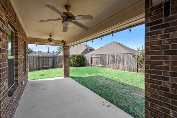 a view of a porch with a backyard