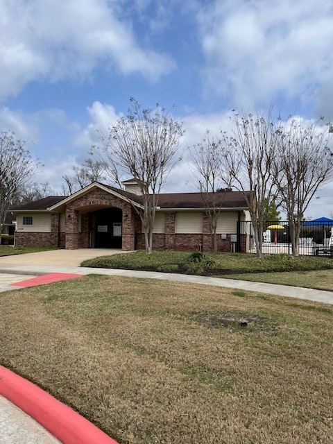 5210 Adria Hills Circle Spring, TX 77389 - Photo 38 of 42 a front view of a house with a yard