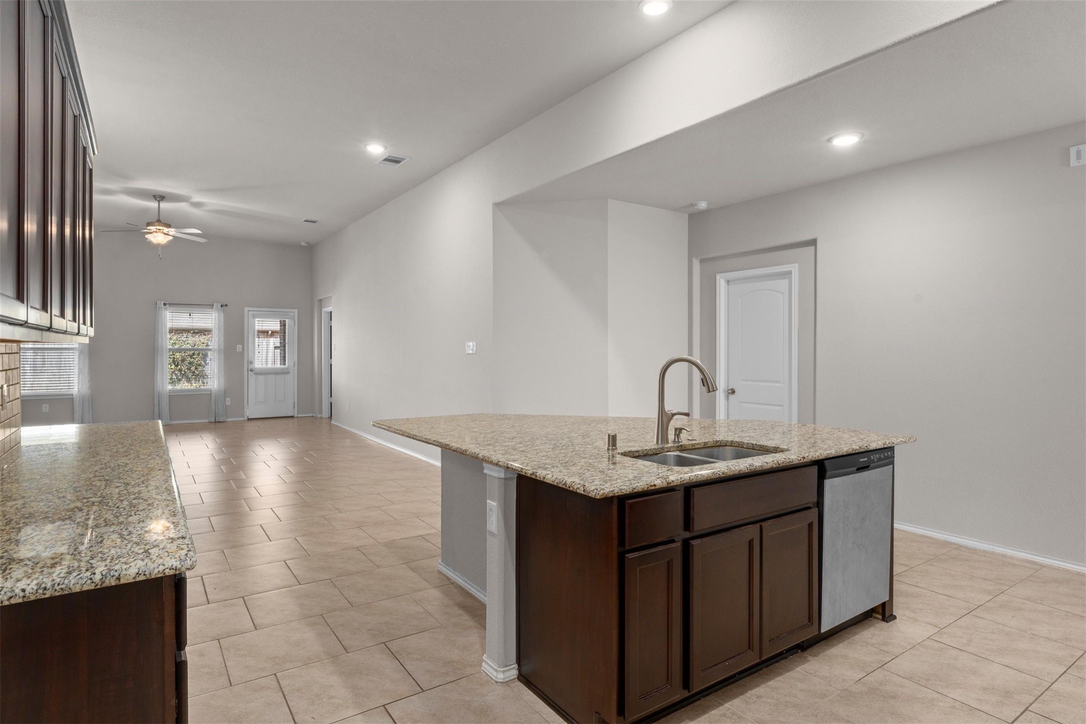 5210 Adria Hills Circle Spring, TX 77389 - Photo 8 of 42 a kitchen with a sink and a mirror