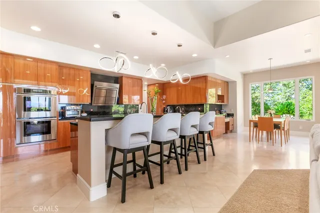 a view of a dining area with furniture window and outside view