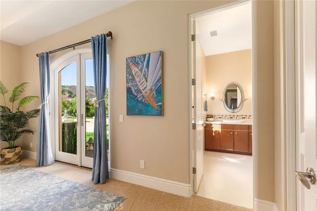 a view of a bedroom from the hallway