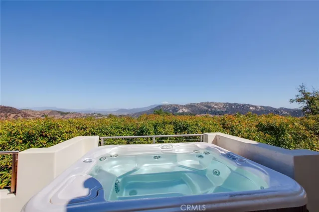 a view of a back yard from a balcony