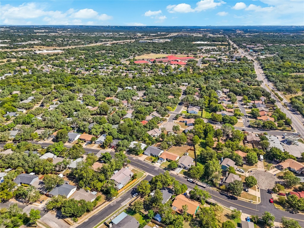7717 Croftwood Drive Austin, TX 78749 - Photo 35 of 40 an aerial view of residential houses with outdoor space and trees