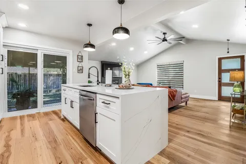 a very nice looking living room with a large window