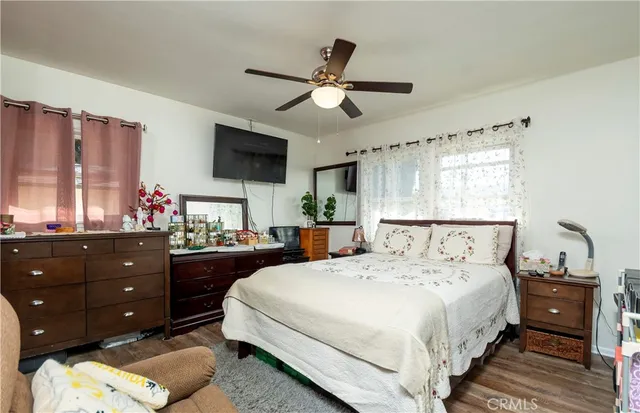 a view of a chair and tables in the patio