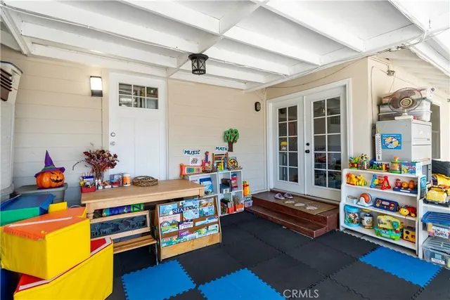 a bathroom with a sink mirror vanity and toilet