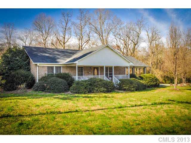 4915 Griffith Road Monroe, NC 28112 - Photo 1 of 16 a view of a house with a yard