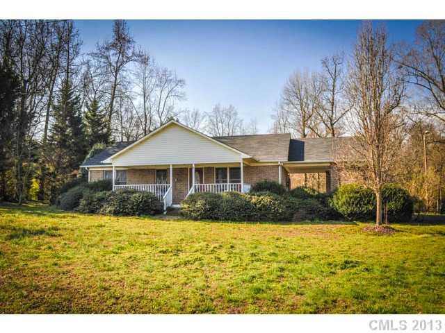 4915 Griffith Road Monroe, NC 28112 - Photo 2 of 16 a front view of house with yard and green space