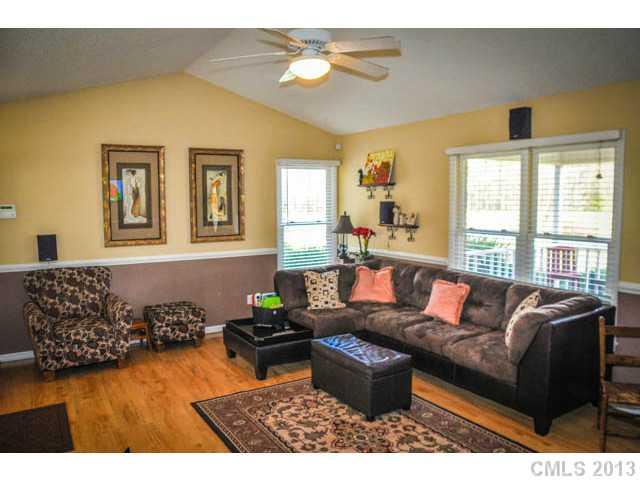 4915 Griffith Road Monroe, NC 28112 - Photo 8 of 16 a living room with furniture and a window