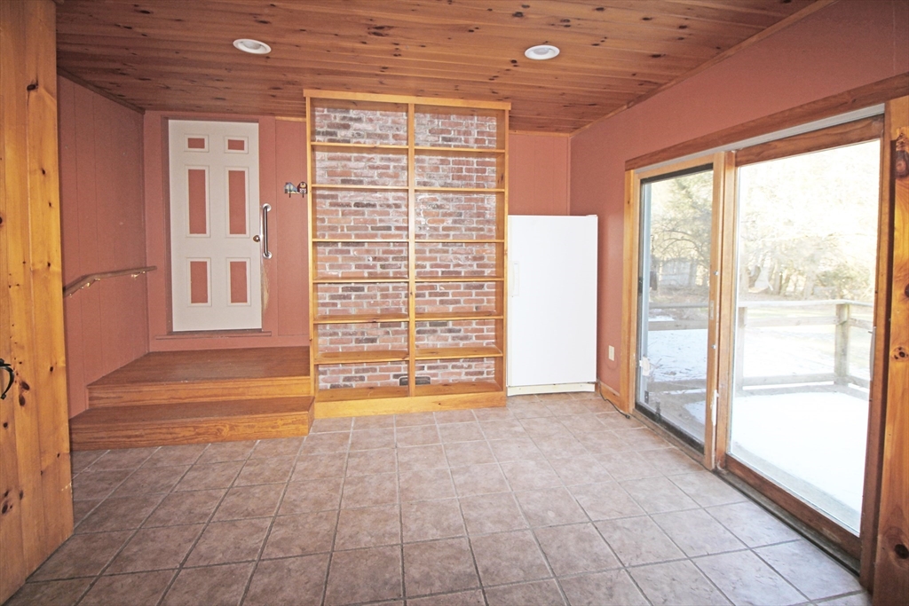 128 Amherst Road Pelham, MA 01002 - Photo 19 of 31 a view of an empty room with a window