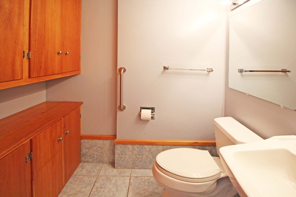 128 Amherst Road Pelham, MA 01002 - Photo 26 of 31 a bathroom with a toilet a sink and bathtub