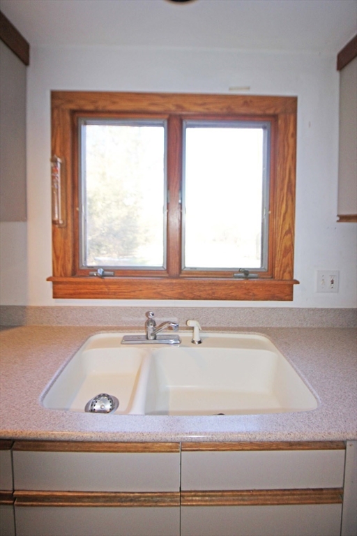 128 Amherst Road Pelham, MA 01002 - Photo 10 of 31 a view of a bath tub sitting in a bathroom next to a window