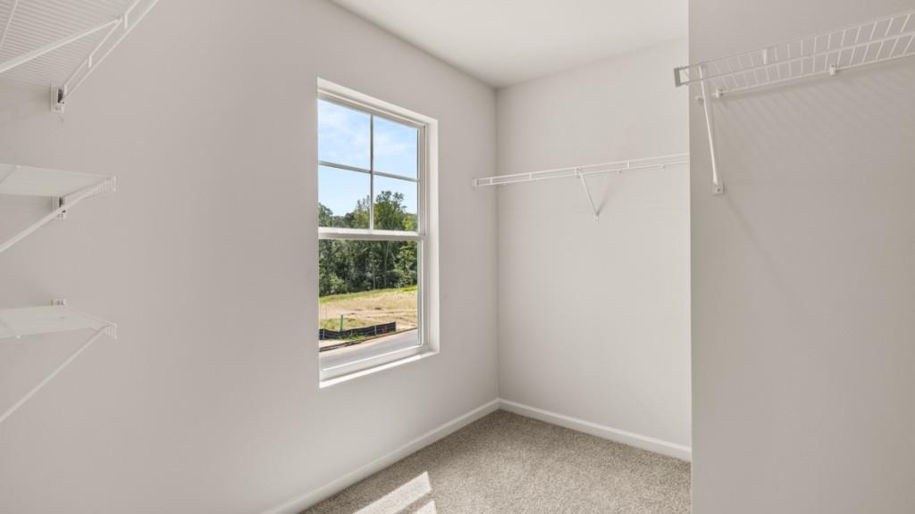 92 Cyrilla Walk Dallas, GA 30132 - Photo 20 of 35 a view of an empty room with a window