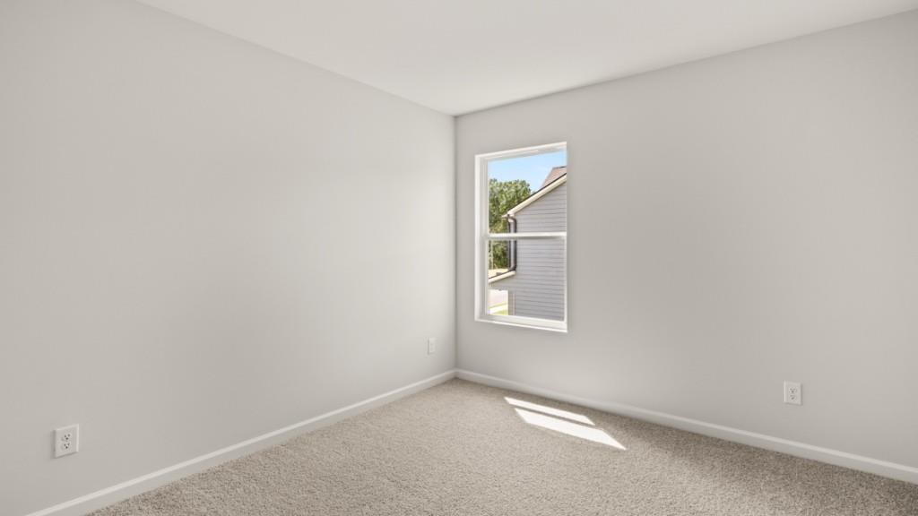 92 Cyrilla Walk Dallas, GA 30132 - Photo 21 of 35 an empty room with windows