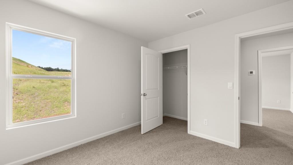 92 Cyrilla Walk Dallas, GA 30132 - Photo 24 of 35 an empty room with a window