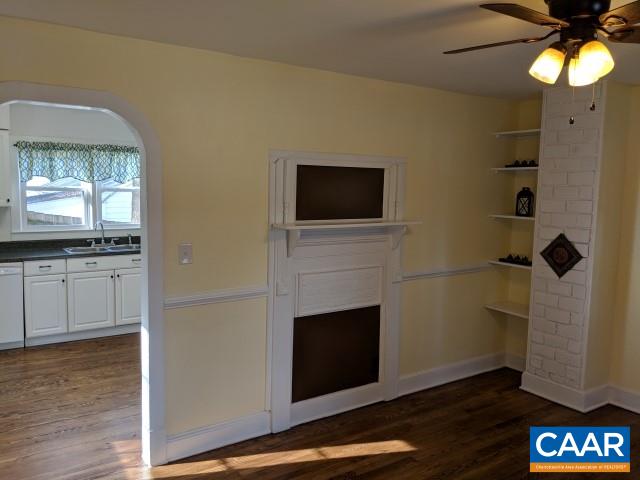 212 Spicers Mill Road Orange, VA 22960 - Photo 13 of 38 a living room with furniture and a fireplace