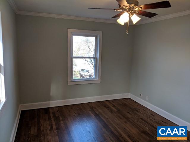 212 Spicers Mill Road Orange, VA 22960 - Photo 16 of 38 an empty room with wooden floor fan and windows