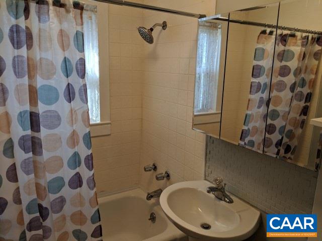 212 Spicers Mill Road Orange, VA 22960 - Photo 17 of 38 a bathroom with a sink toilet and shower
