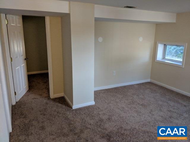 212 Spicers Mill Road Orange, VA 22960 - Photo 28 of 38 an empty room with a door