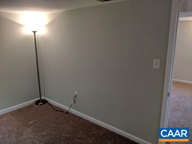 212 Spicers Mill Road Orange, VA 22960 - Photo 31 of 38 a view of a room with rack on the wall