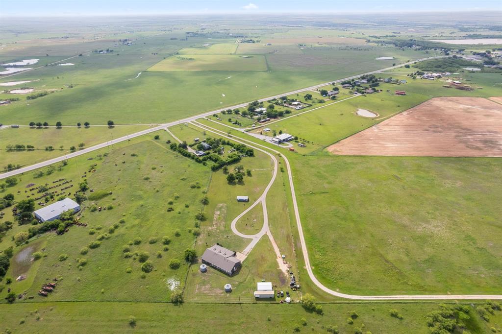 13315 Highway 281 Scotland, TX 76379 - Photo 39 of 40 Expansive rural property featuring a main residence with a large shop, separate living space and extensive green space