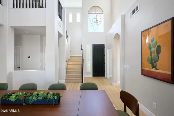 a view of entryway with wooden floor