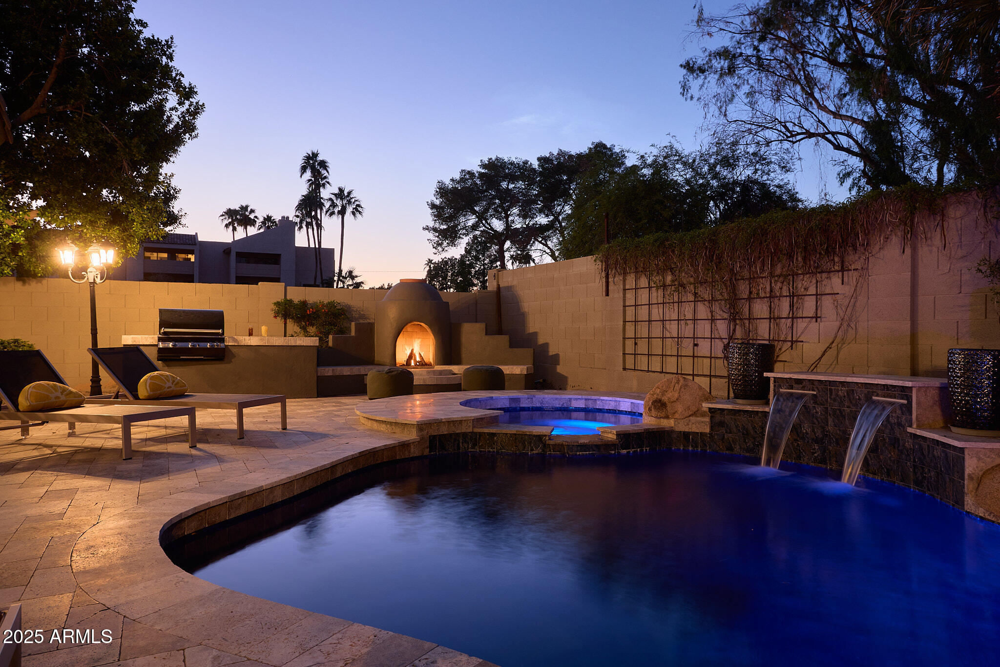3202 East Orange Drive Phoenix, AZ 85018 - Photo 3 of 52 a view of a swimming pool with sitting area