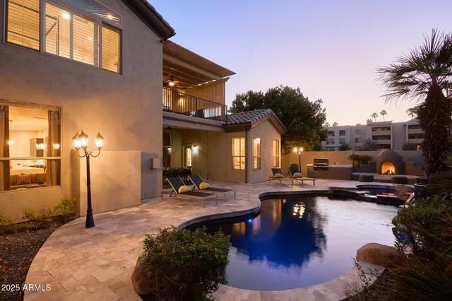 a view of a lobby with chair and tables