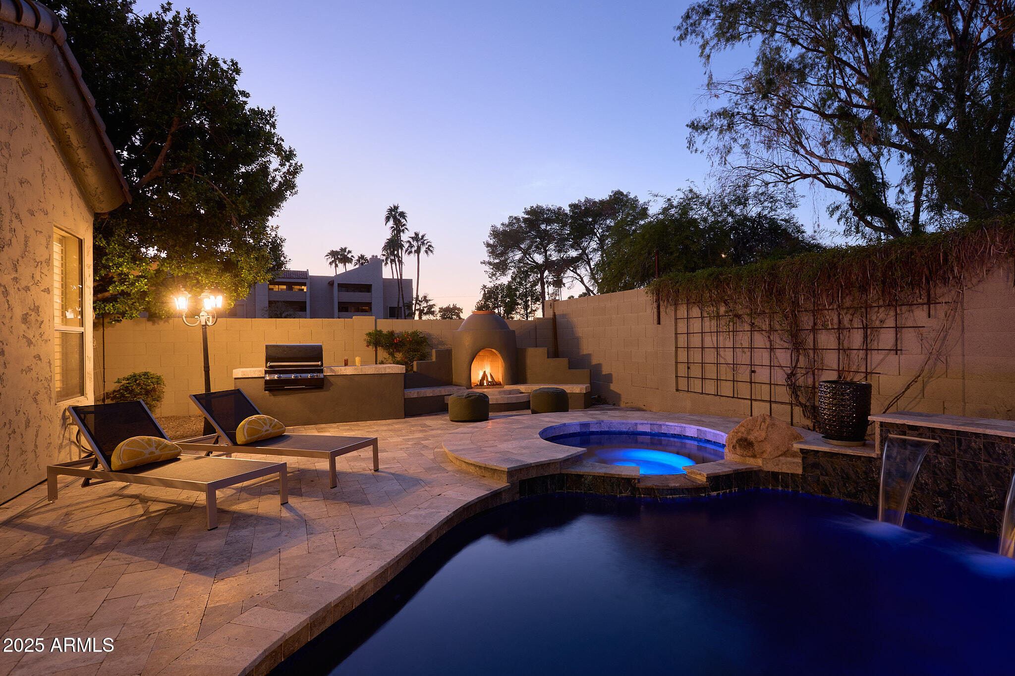 3202 East Orange Drive Phoenix, AZ 85018 - Photo 50 of 52 a view of a patio with swimming pool table and chairs
