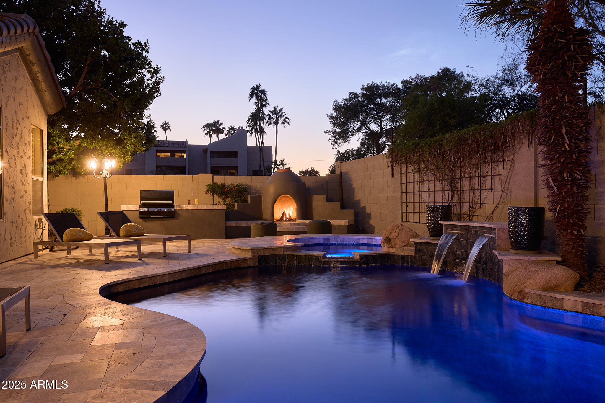 3202 East Orange Drive Phoenix, AZ 85018 - Photo 52 of 52 a view of a swimming pool with outdoor seating