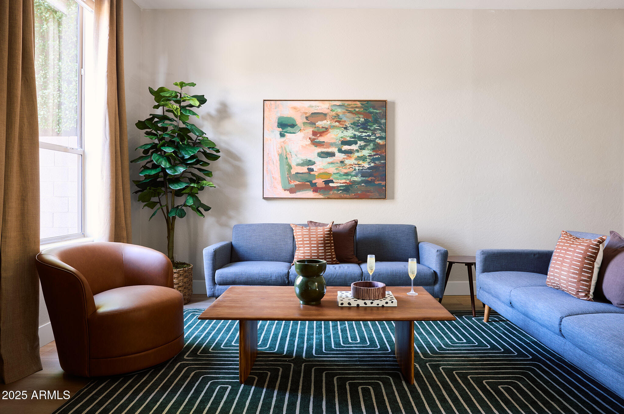3202 East Orange Drive Phoenix, AZ 85018 - Photo 6 of 52 a living room with furniture plant and a window