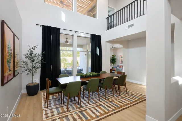 a view of a dining room with furniture window and outside view