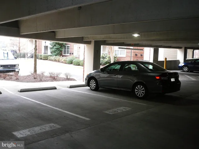 a view of a cars parked in garage