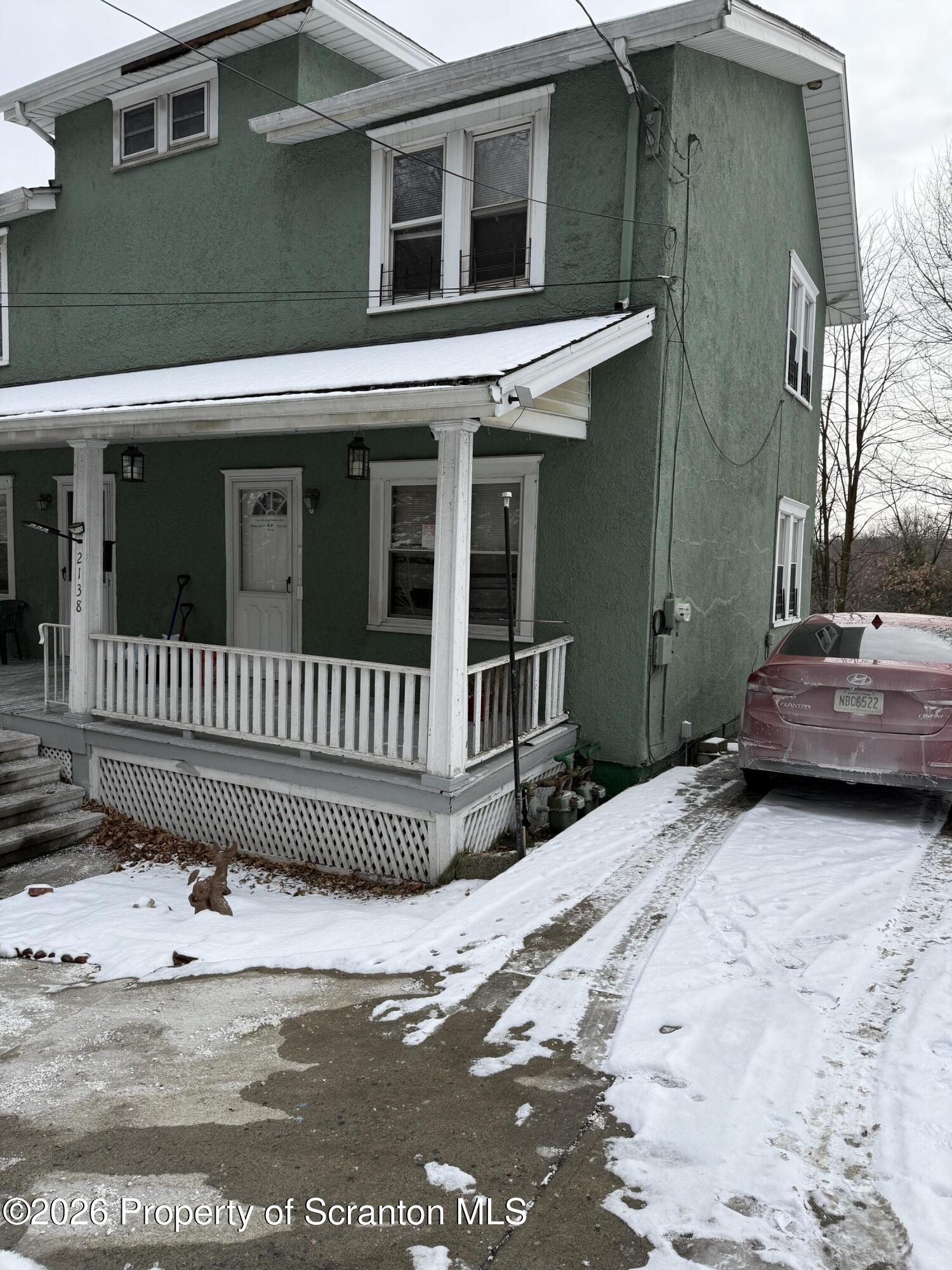 2140 Pond Avenue Scranton, PA 18508 - Photo 3 of 16 a view of a house with a yard