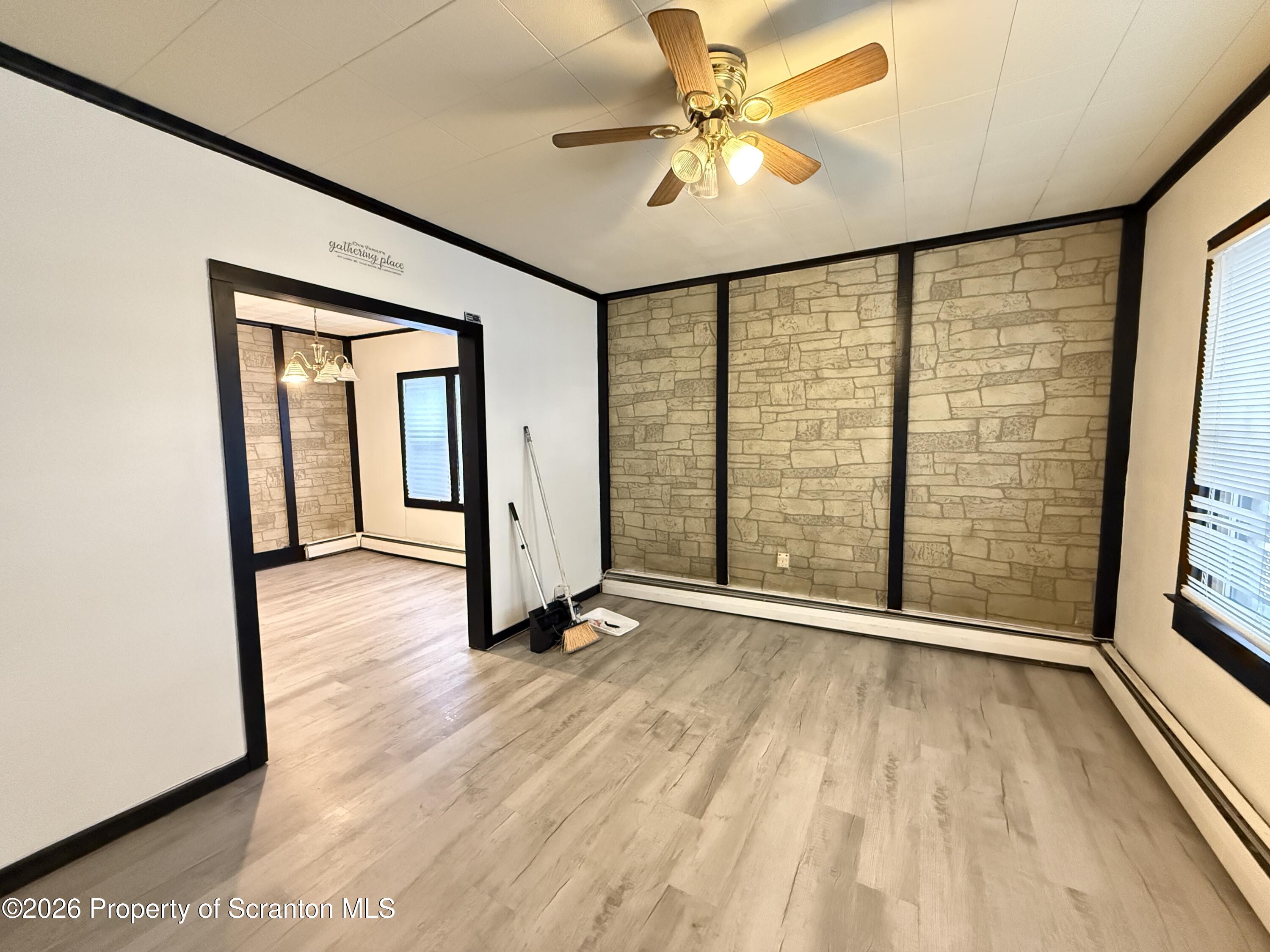 2140 Pond Avenue Scranton, PA 18508 - Photo 4 of 16 wooden floor in an empty room with a window
