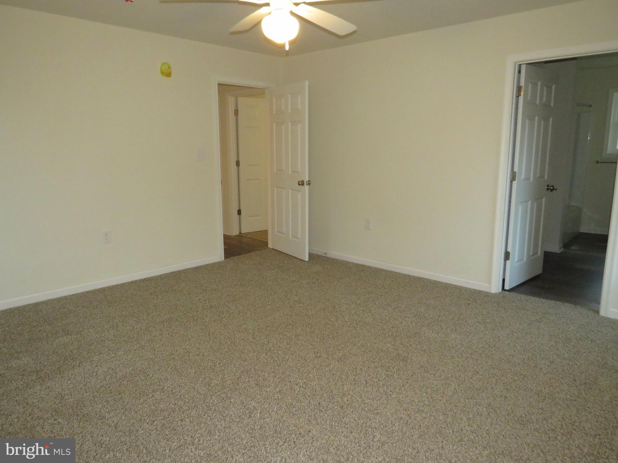 26350 East Pear Street Crisfield, MD 21817 - Photo 15 of 22 an empty room with a bathroom