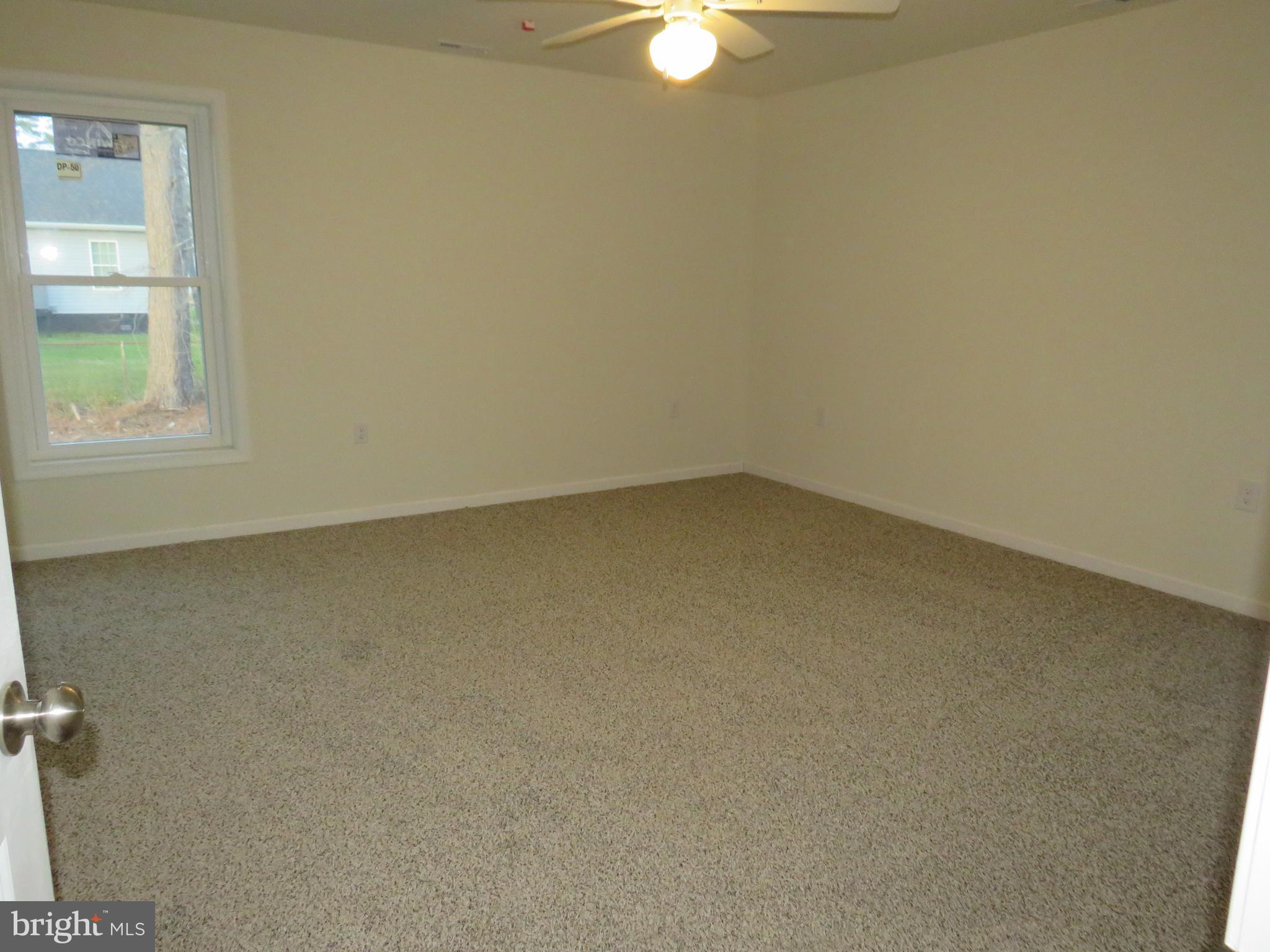 26350 East Pear Street Crisfield, MD 21817 - Photo 16 of 22 an empty room with a window