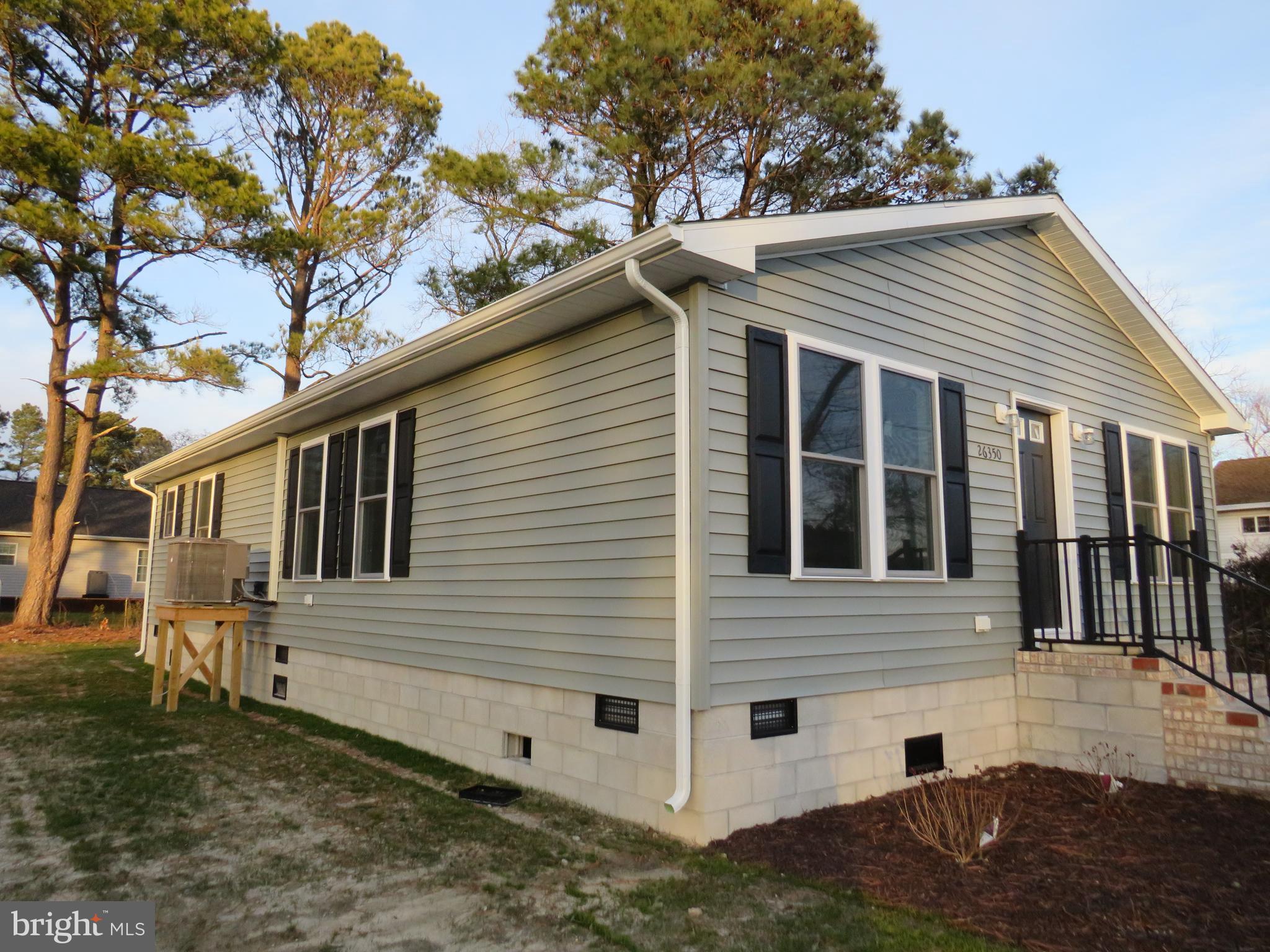 26350 East Pear Street Crisfield, MD 21817 - Photo 2 of 22 a view of a house with a yard