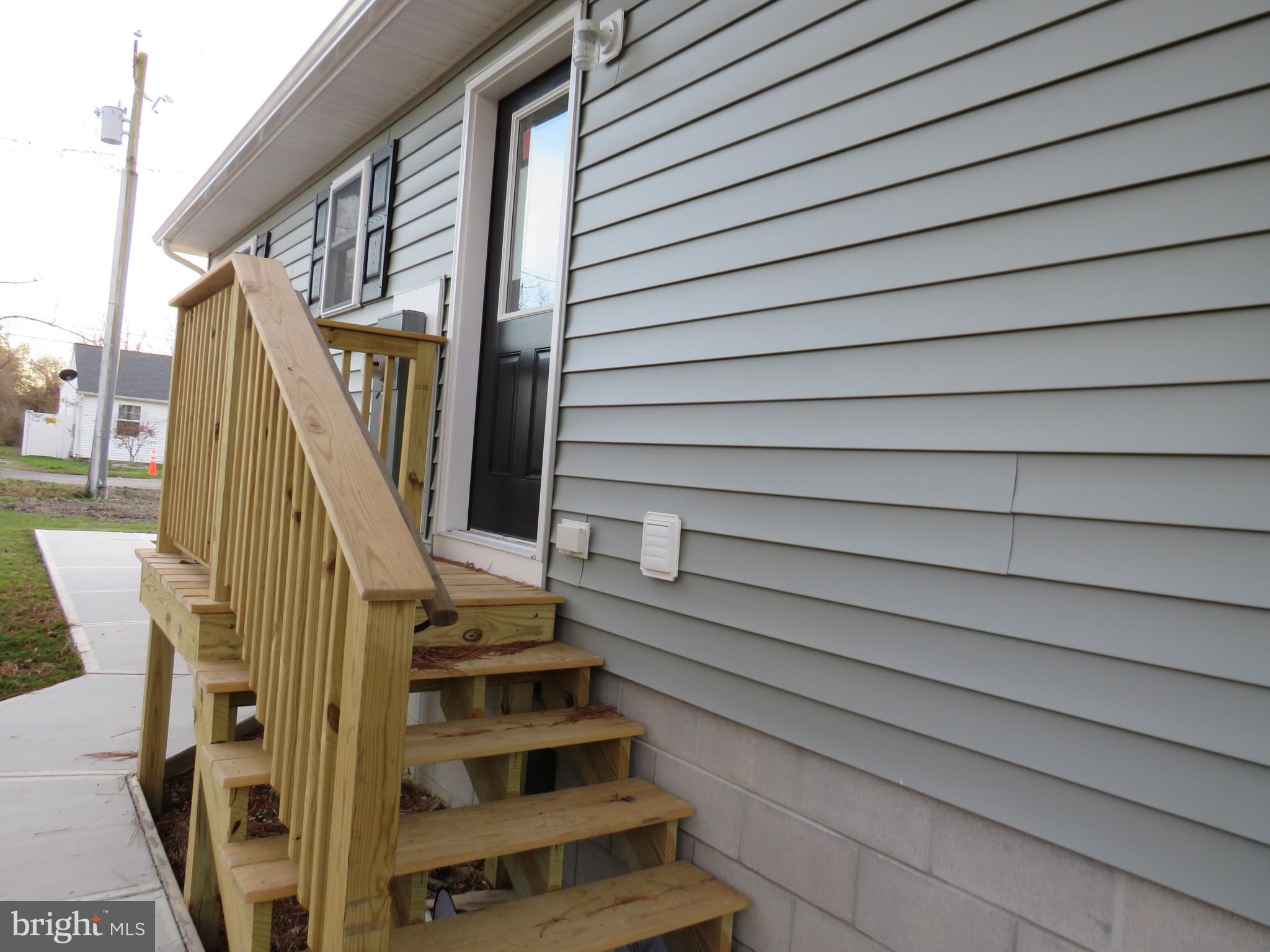 26350 East Pear Street Crisfield, MD 21817 - Photo 4 of 22 a view of entryway with wooden floor