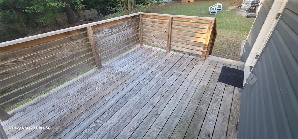 1009 Fairburn Road Northwest Atlanta, GA 30331 - Photo 4 of 15 a view of balcony with wooden floor